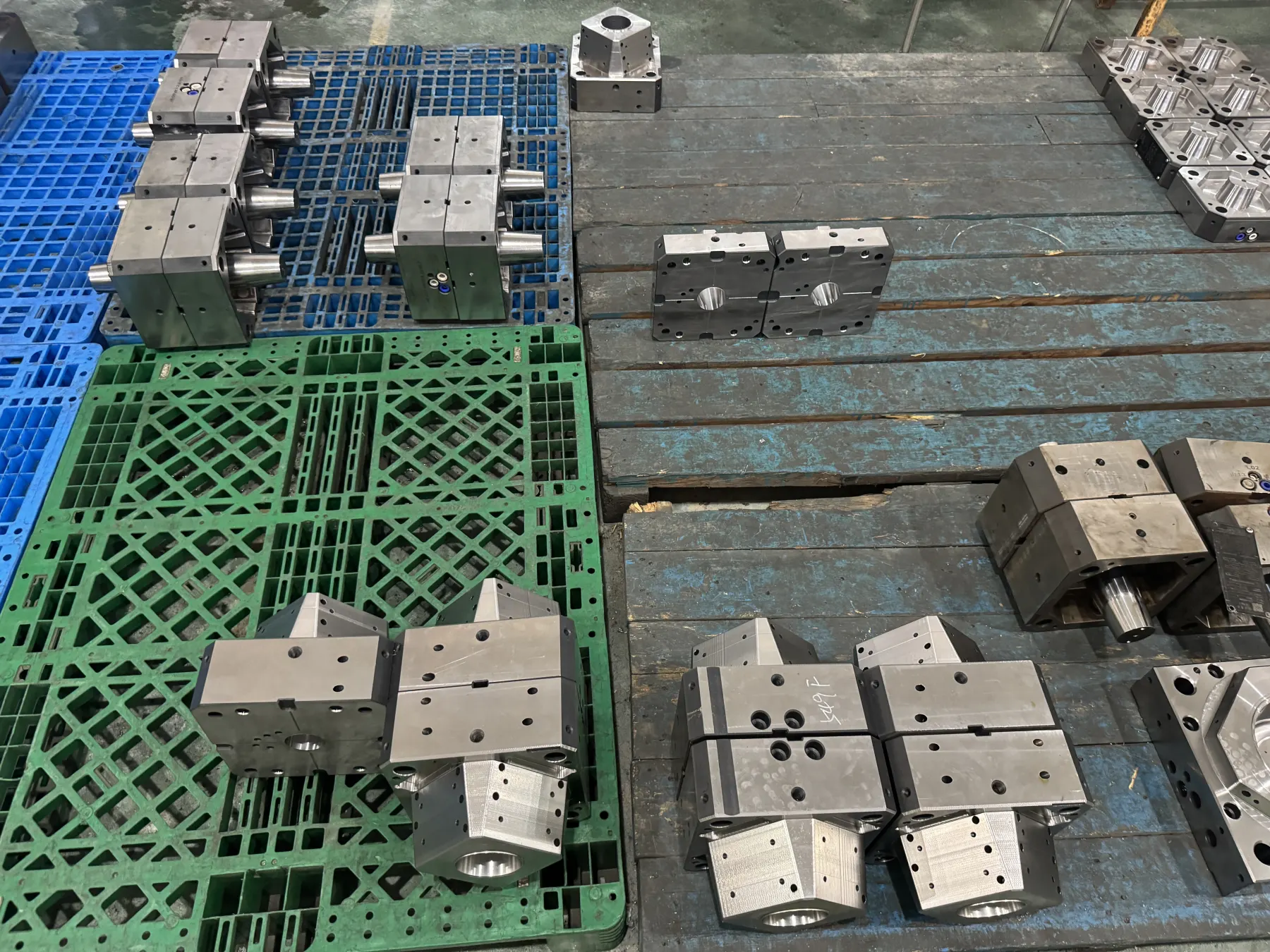 Finished precision mould inserts grouped for inspection and fitting